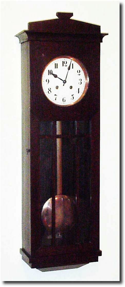 C.1910, German, for the U.S. market, arts and crafts style oak wall regulator, spring driven. — Antique Clocks Price Guide