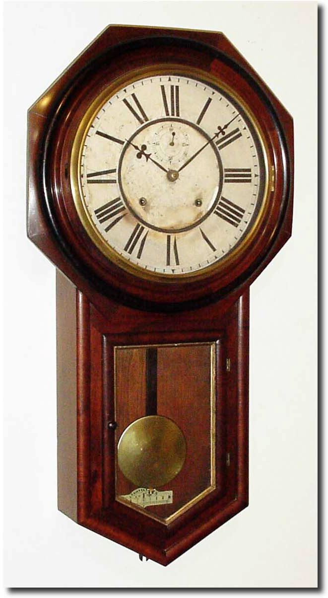 C.1910, Ansonia "Regulator A', long drop school clock in walnut, with restorations. — Antique Clocks Price Guide