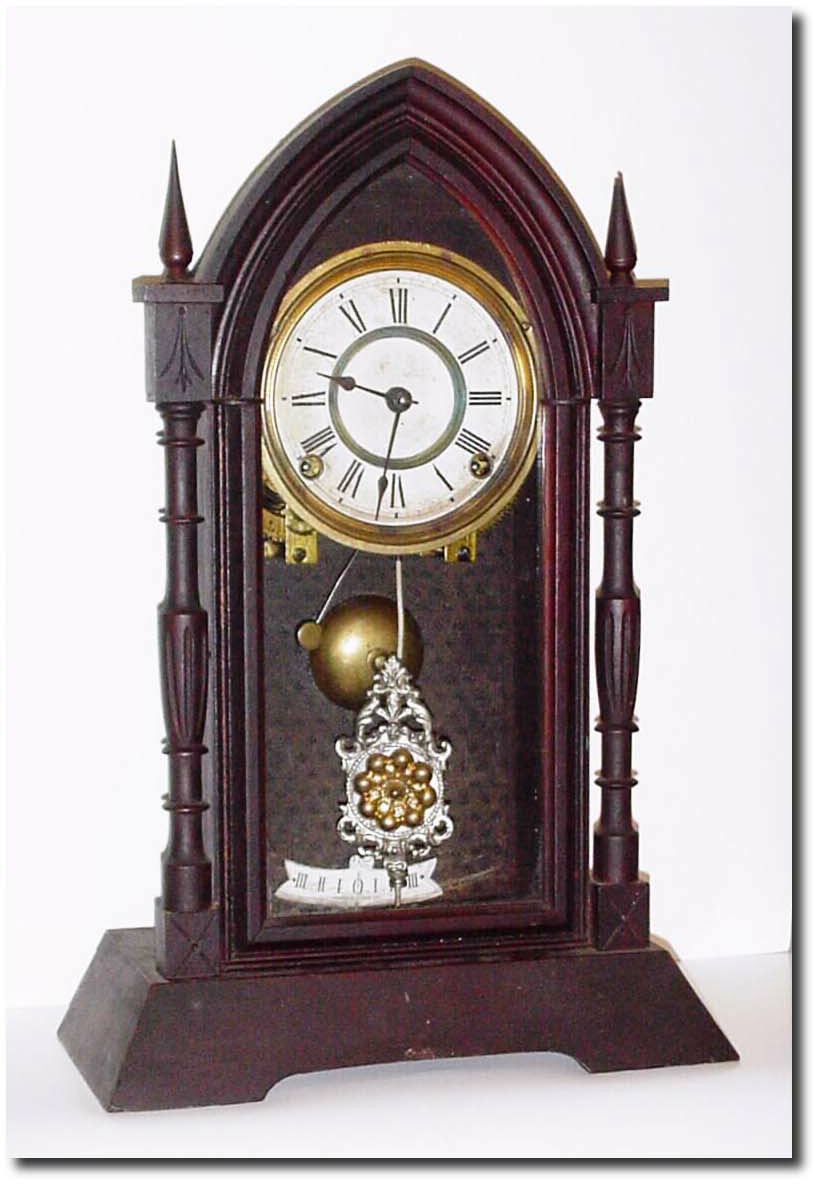 C.1885, Ansonia "Epsom' in walnut, 8-day, as found. — Antique Clocks Price Guide