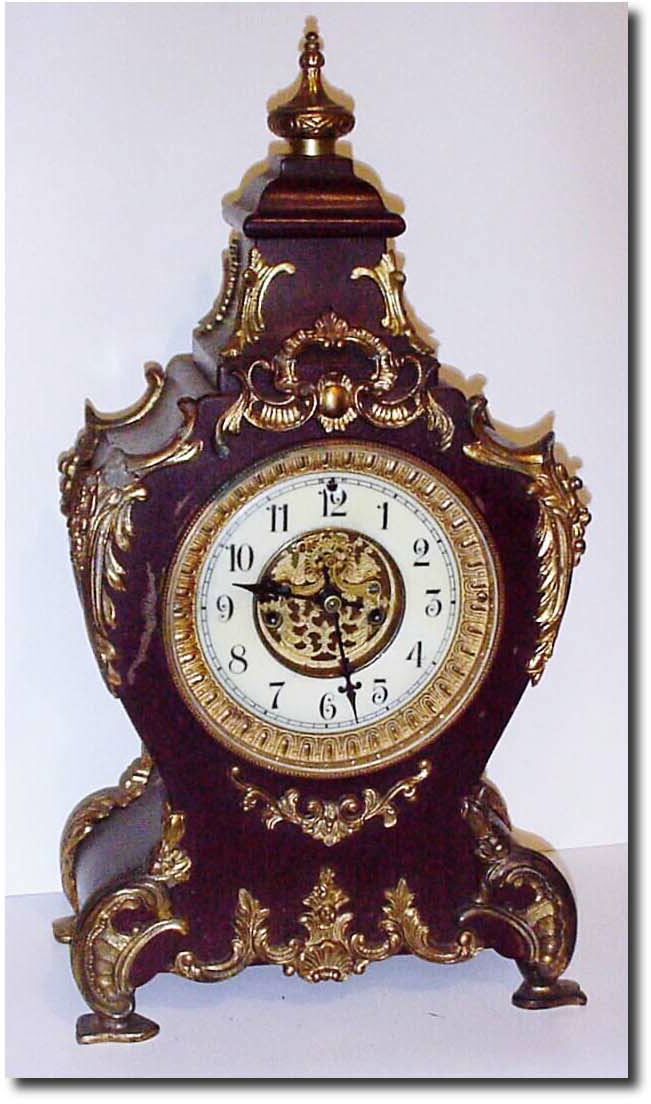 C.1895, Waterbury "Louis' enameled iron mantel clock in good condition. — Antique Clocks Price Guide