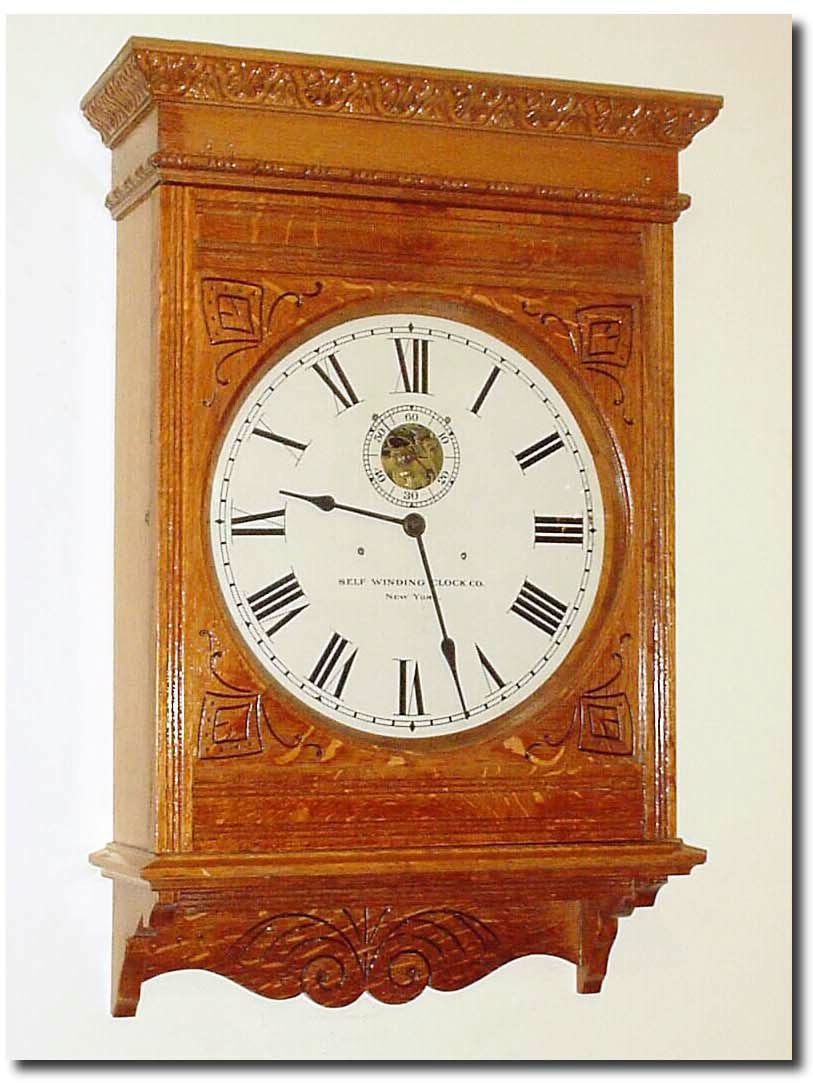C.1908, Self Winding Clock Co., New York, Model No. 10 wall clock in oak. — Antique Clocks Price Guide