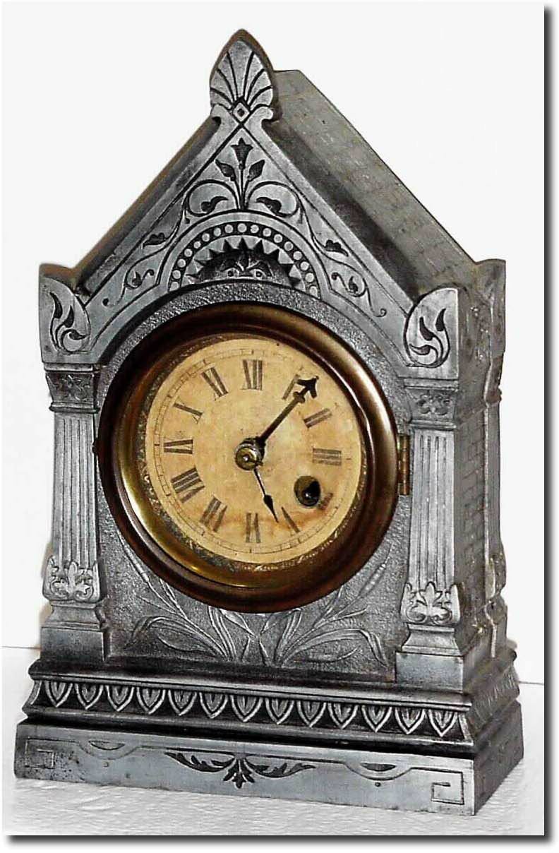 C.1868, The Terry Clock Co., Waterbury, Conn, Terry "Patent Timepiece', in a cast spelter architectural case, now without finish. — Antique Clocks Price Guide