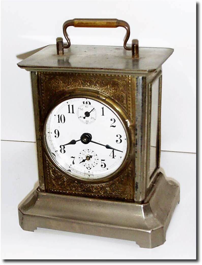C.1900, German, Musical Alarm clock, nickel over stamped steel construction, alarming with the tune of "Dixie'. — Antique Clocks Price Guide