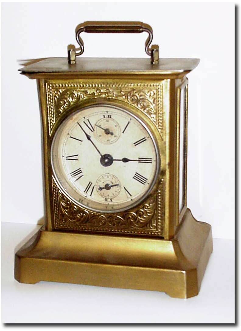 C.1900, German, Musical Alarm clock, stamped steel construction, now painted gold, alarming with two good tunes:"Bicycle Built for Two' and "My Country "Tis of Thee'. — Antique Clocks Price Guide