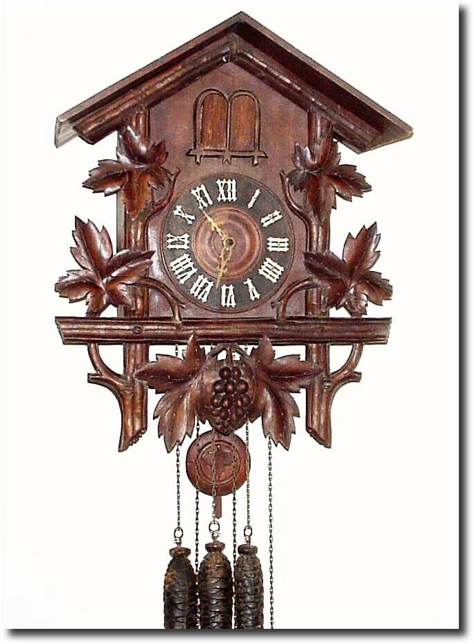 C.1920, German, a Large Leaf and Grape cuckoo (less top trim). — Antique Clocks Price Guide
