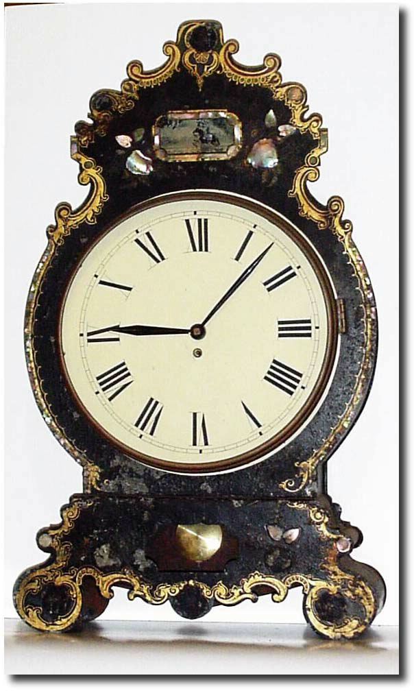 Mixed lot: This is C.1850 stenciled tin case with MOP, now with a small German fit-up movement, and repainted dial. — Antique Clocks Price Guide