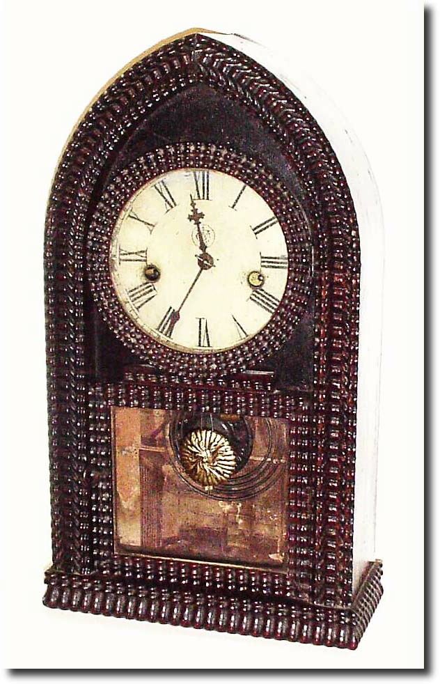Mixed lot: a C.1845 J.C. Brown Mini Ripple case, beehive, with original finish and great patina, NOW with a Waterbury 30 hour time and strike movement, dial, gong, hands. (Illegible label) The case is sound and has great potential if you have an early movement. — Antique Clocks Price Guide