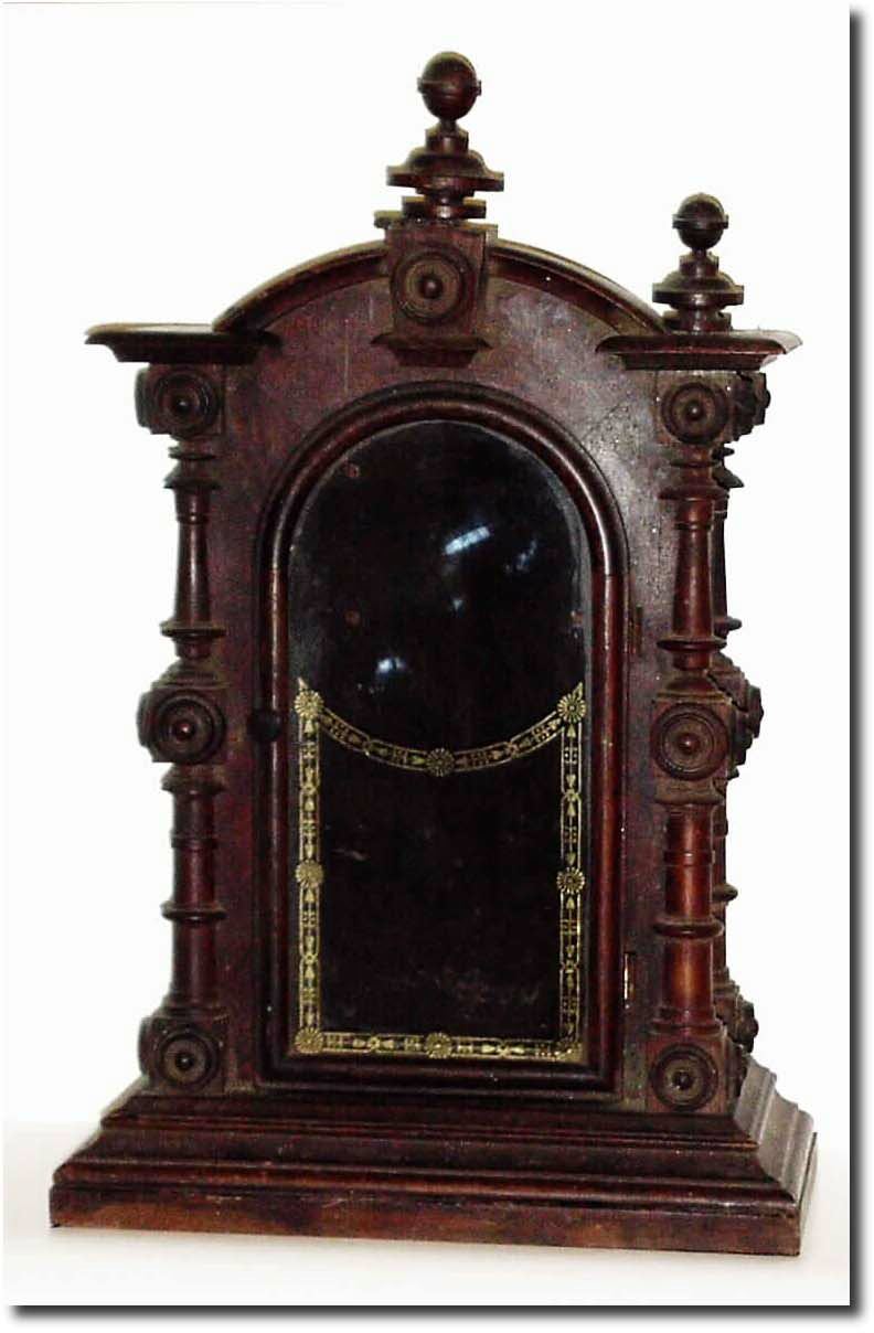 C.1875, Case Only, Welch, Spring and Co, "Patti', as-found, less one finial, a strip of veneer and small molding. — Antique Clocks Price Guide