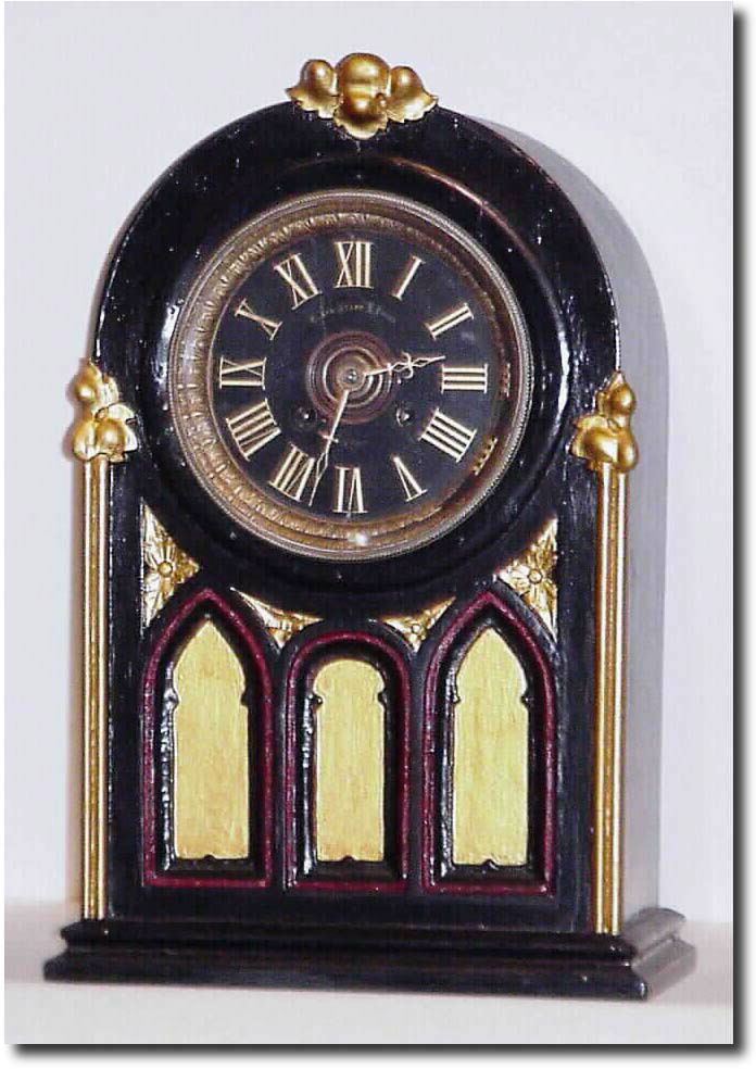 C.1900, Mixed lot: an oak clock case, now painted black and gold, also now with another French 8-day gong strike movement with black slate dial and gilt hands. — Antique Clocks Price Guide