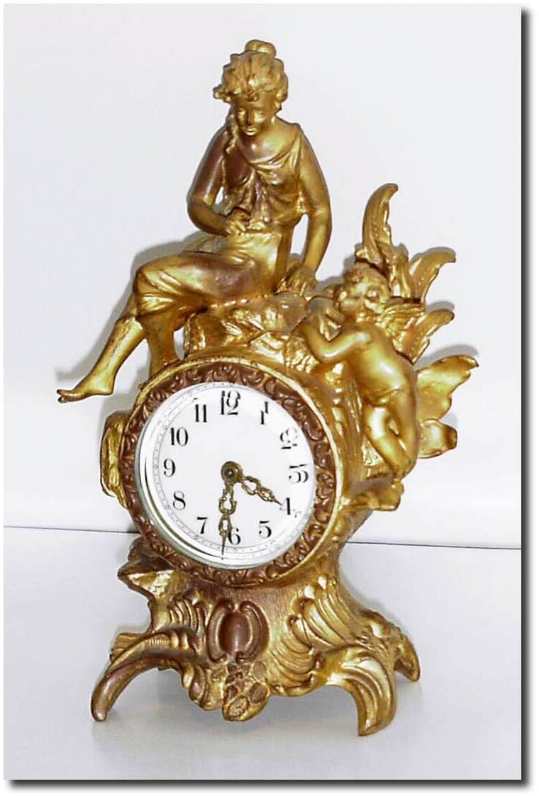 C.1910, Incomplete, an American ladies dresser clock, gilt spelter with about 50 percent gilding intact but with an incomplete movement. — Antique Clocks Price Guide