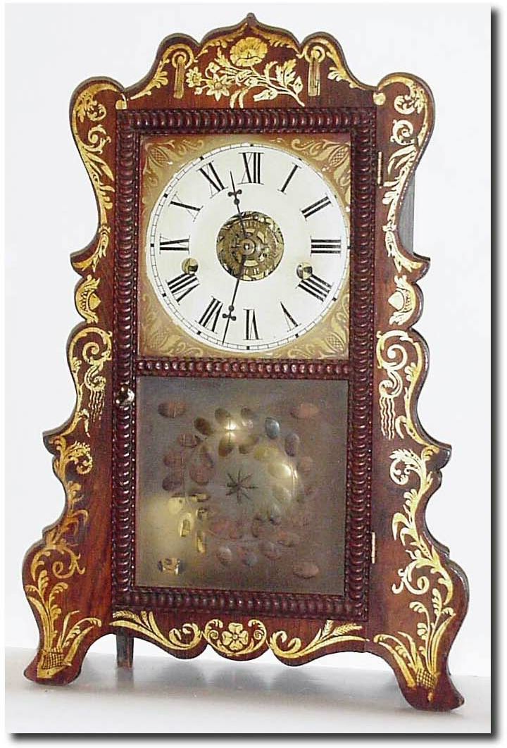 C.1855, E and A Ingraham, Rosewood scalloped shelf clock with excellent original stenciling. — Antique Clocks Price Guide