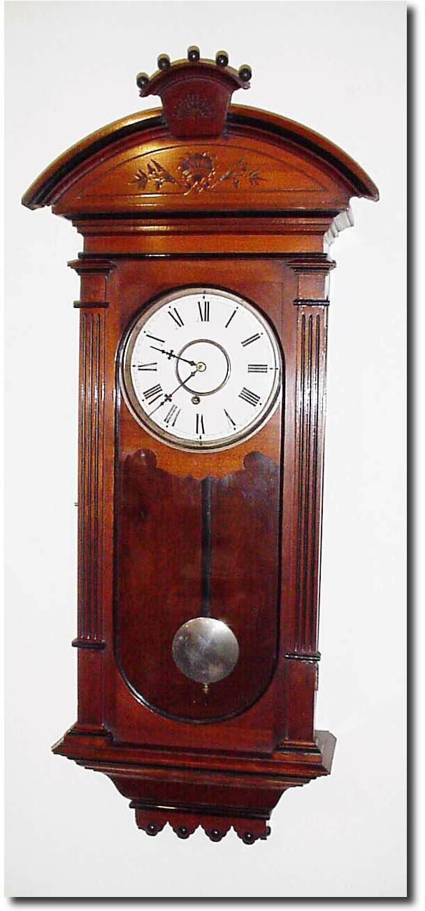 C.1880, Waterbury Clock Co., "ONTARIO' walnut wall clock in exceptional original condition. — Antique Clocks Price Guide