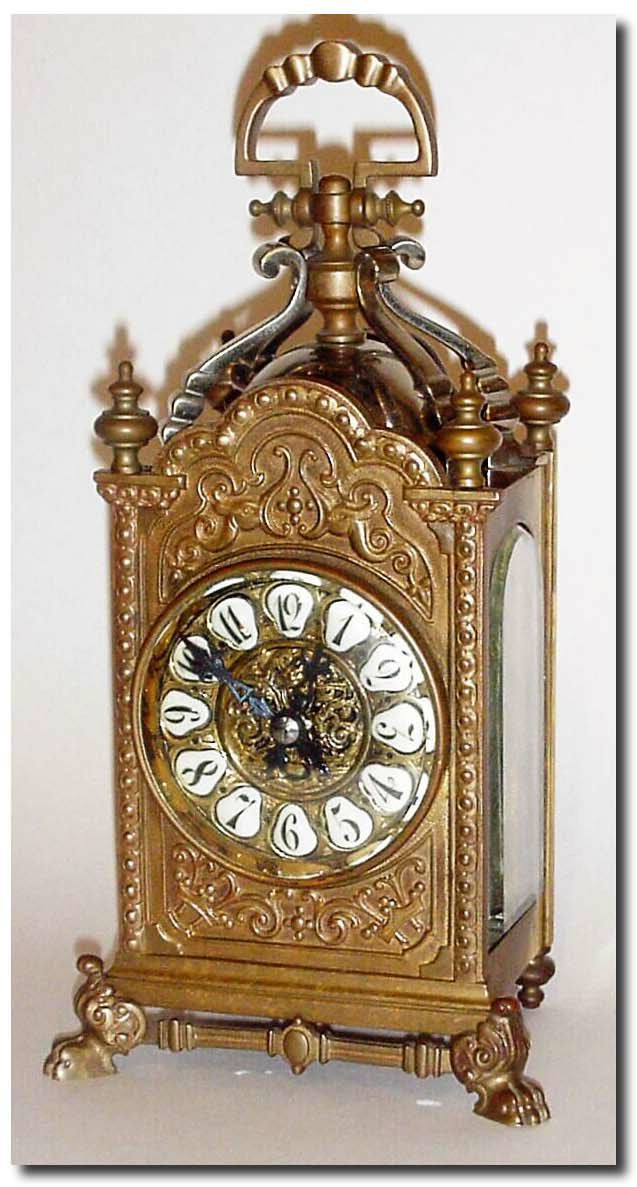 C.1890, French, Brass Form Cased Carriage clock in the shape of a continental lantern clock with bell on top, by E. Maurice and Co, Paris (movement signed and with number 12093). — Antique Clocks Price Guide
