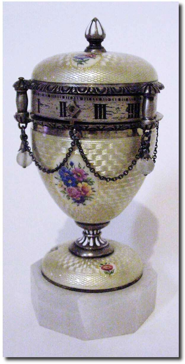 C.1870, Austrian, Mini Annular Dial clock, enamel over silver, with hand painted floral displays. — Antique Clocks Price Guide