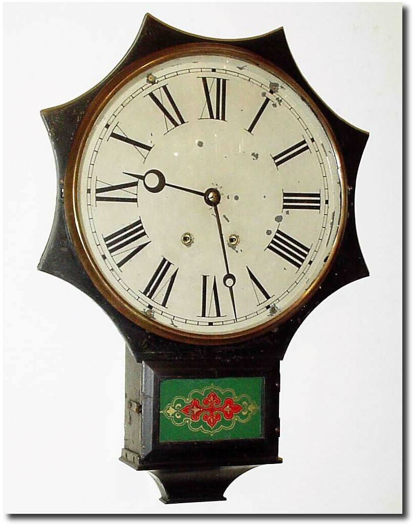 C.1870, Terry Clock Co., Waterbury, Conn. Short drop dial, iron front in excellent original condition, with gold decorations intact (a little weak but definitely there). — Antique Clocks Price Guide