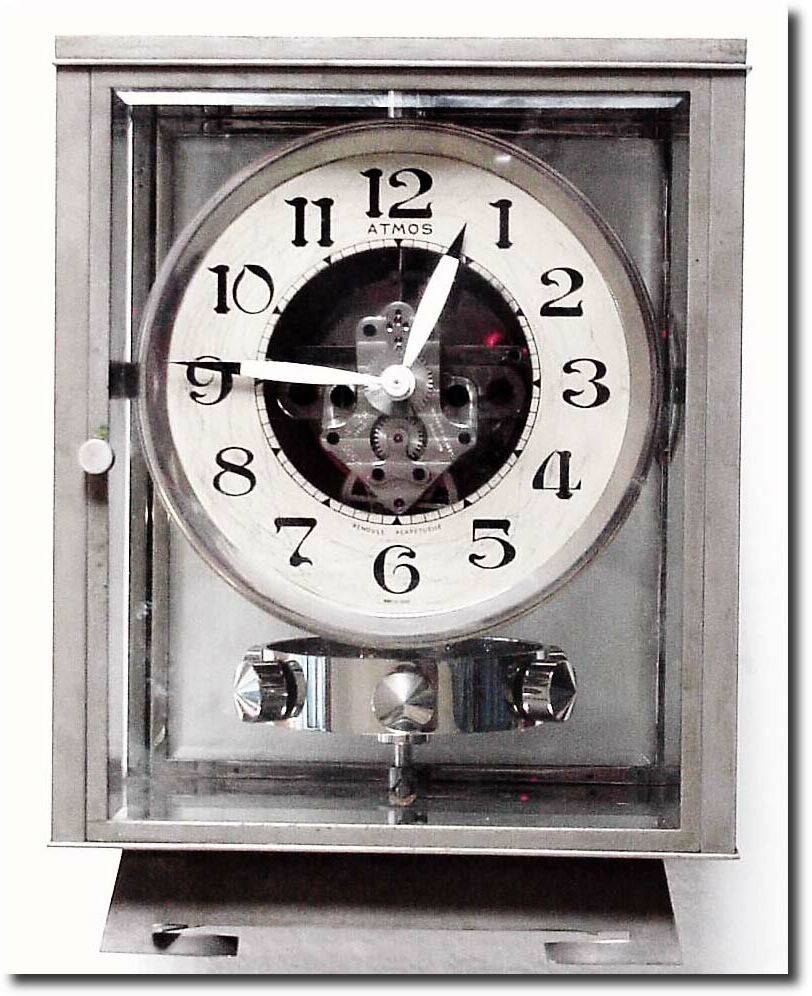 C.1929, French, J. L. Reutter, Original "Atmos' Classique B1 model with mercury tube winding, serial no. 6652. (discontinued 1932) This clock came to us from storage, and has a light coat of oxidation across the nickel plated case. — Antique Clocks Price Guide