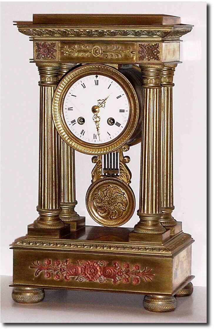 C.1890, French, Marti, for J.E. Caldwell, Philadelphia (full signature on movement), a good ormolu 4-column Empire clock. — Antique Clocks Price Guide