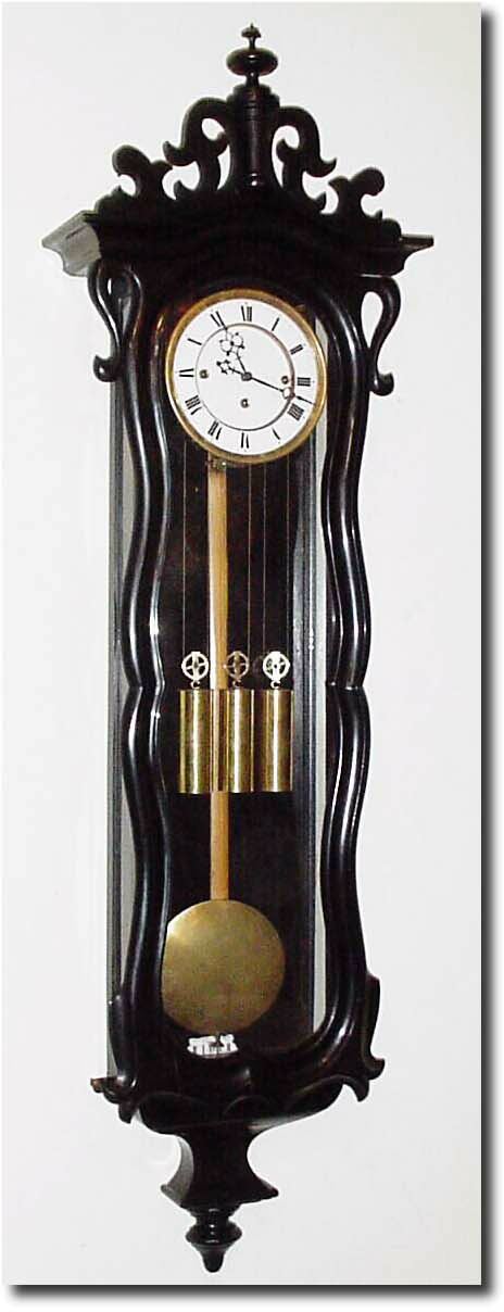 C.1860, Austrian, 3-Weight Grand Sonnerie, in a long serpentine case with 72 beat movement. — Antique Clocks Price Guide