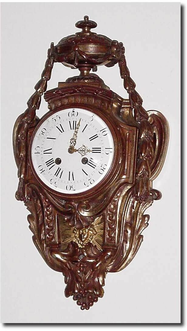 C.1885, French, for Tiffany and Co. (signed on movement), a heavy bronze cartel clock, with most of the gilding worn off. — Antique Clocks Price Guide