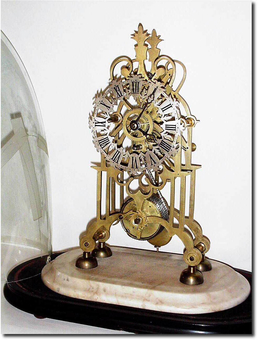 C.1860, English, Skeleton Clock, Chain Fusee, with fancy pierced and silvered dial. — Antique Clocks Price Guide