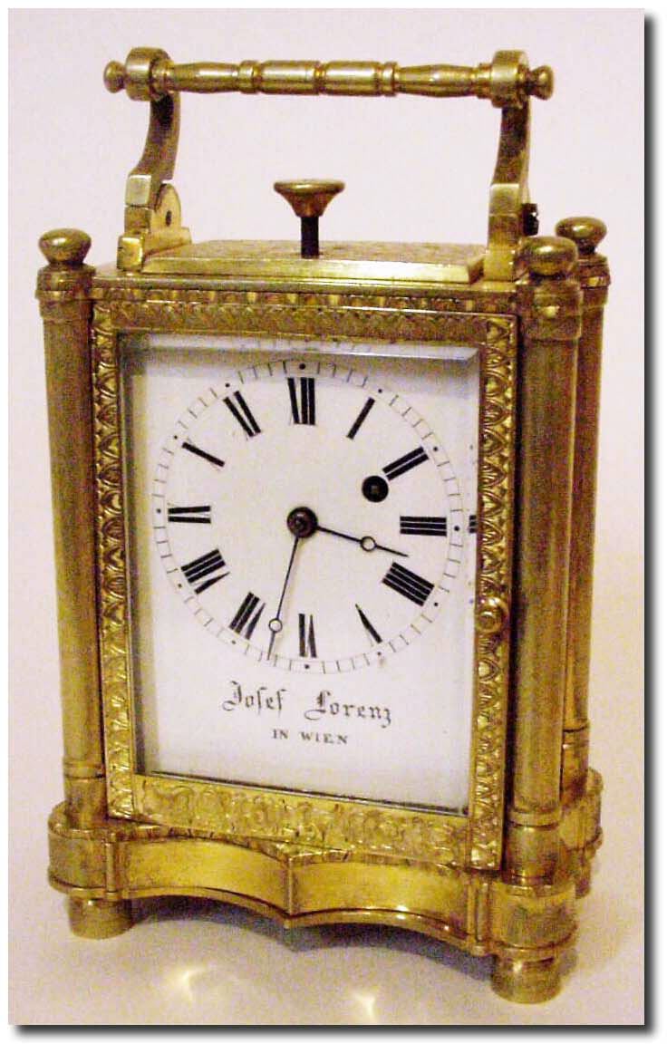 C.1840, Austrian, 30-hour, Quarter repeating carriage clock, the repeat mechanism actuated by a plunger above 12. — Antique Clocks Price Guide