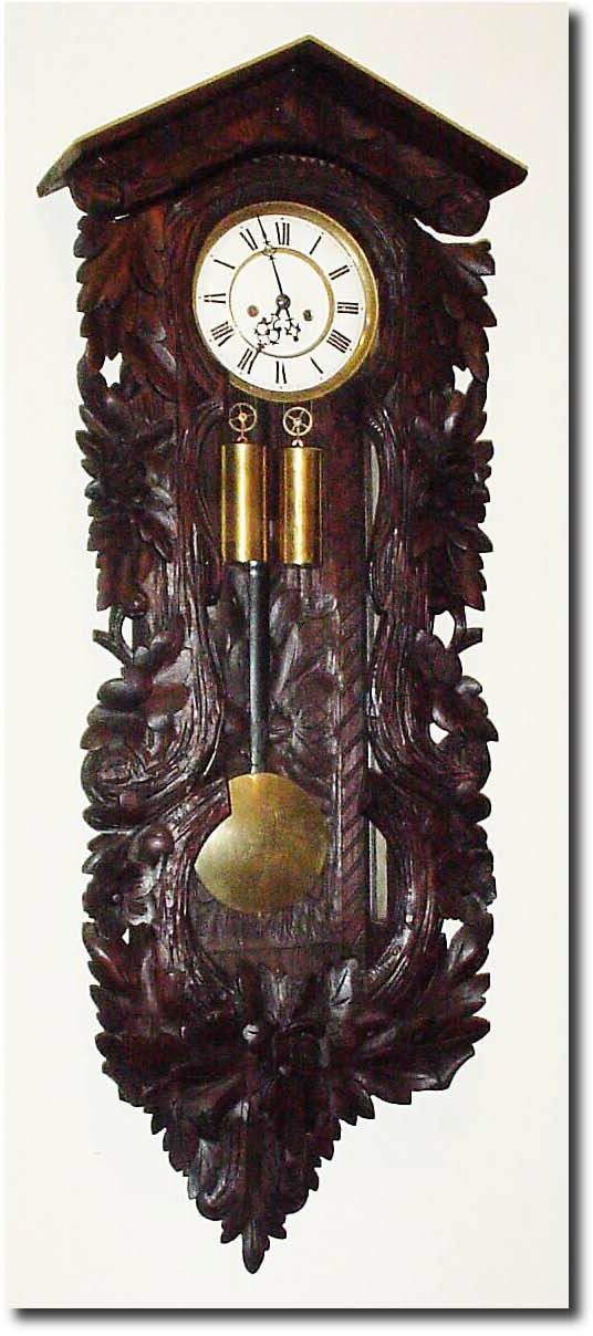 C.1900, German, Carved Black Forest 2-weight wall regulator / the Gustav Becker movement of the same period, but not original to the case. — Antique Clocks Price Guide