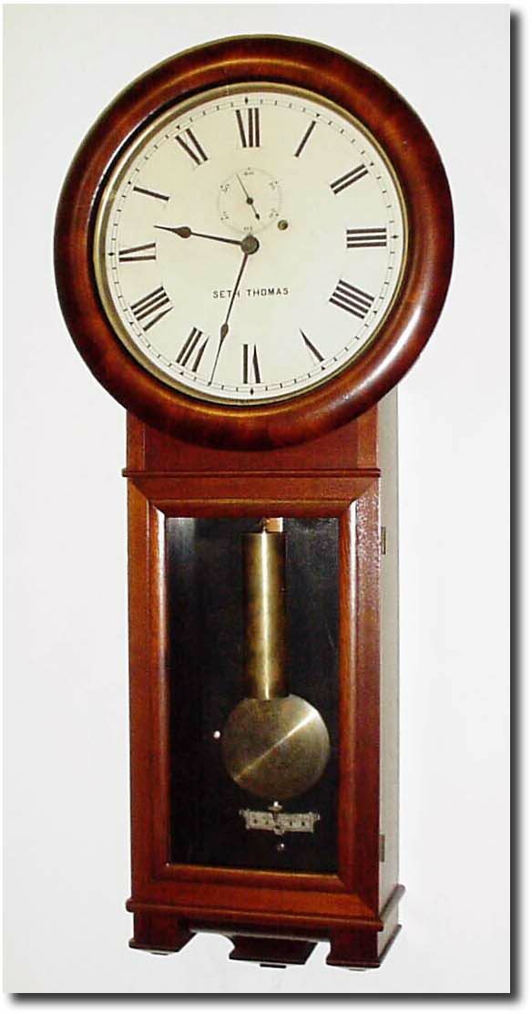 C.1900, Seth Thomas, "Regulator No. 2 in walnut and in generally very good condition. — Antique Clocks Price Guide