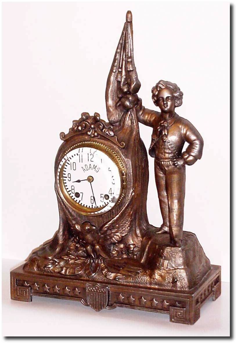 Late 19th Century, American, 8-day, Pivoted Pendulum cast spelter novelty, the replacement plastic dial now signed "Adams'. — Antique Clocks Price Guide