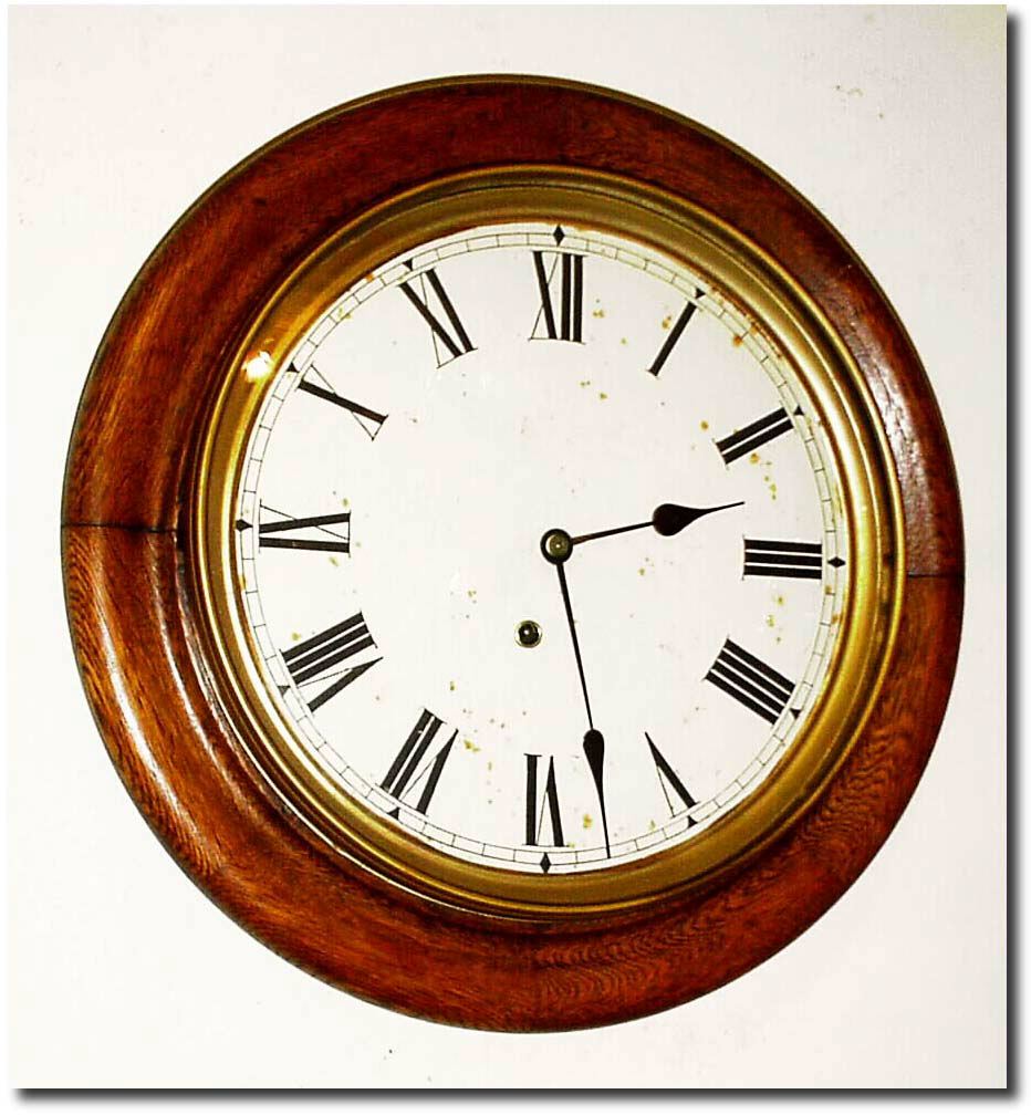 C.1925, Ingraham "Milford', Golden Oak, (medium shade) round gallery clock in very good condition. — Antique Clocks Price Guide