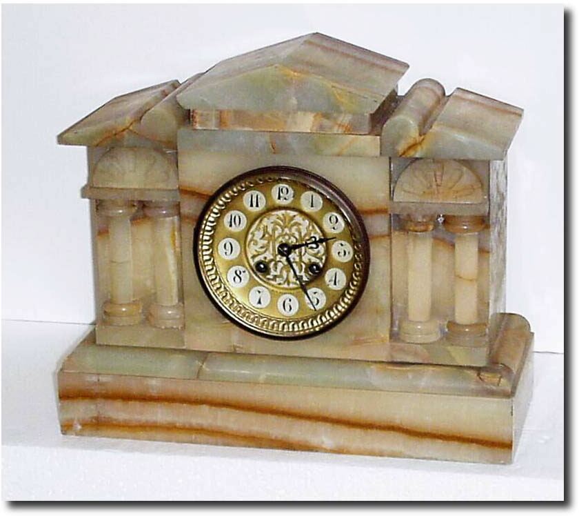 C.1900, French, for W. L. Kelley, New Bedford, Mass (signed dial) a tan onyx mantel clock in good original condition. — Antique Clocks Price Guide