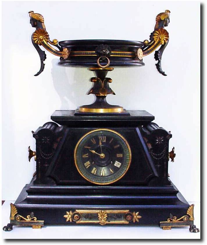 C.1895, French, Black Marble and bronze clock, in Egyptian motif. — Antique Clocks Price Guide