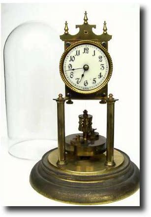 C.1910, German, Urania Clock Co., 400-Day, disc pendulum clock — Antique Clocks Price Guide