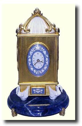 C.1984, Swiss, Faberge, "Swan Lake Musical Clock" — Antique Clocks Price Guide
