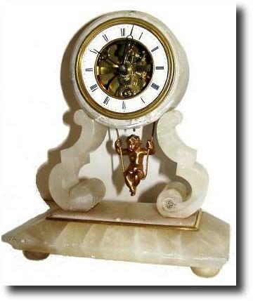 C.1900, French Swinging Doll Clock, — Antique Clocks Price Guide