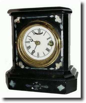 C.1868, Hubbell Mini Cast Iron shelf clock — Antique Clocks Price Guide