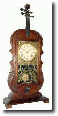 A Late 20th Century reproduction of a Seth Thomas VIOLIN clock, — Antique Clocks Price Guide