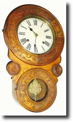 Mixed lot: a C.1910 carved figure 8 case, — Antique Clocks Price Guide