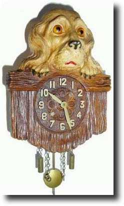 C.1935, Keebler Clock Co., Philadelphia, PA, Cocker Spaniel Over Fence, novelty clock — Antique Clocks Price Guide
