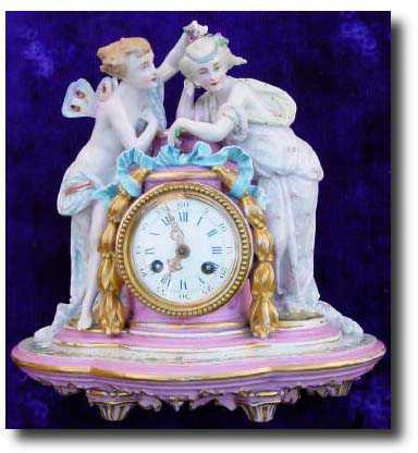C.1890, French Porcelain figural clock, — Antique Clocks Price Guide