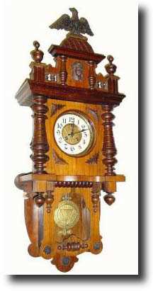 C.1910, Urania Clock Co., 8-day Berlin style "free swinger". — Antique Clocks Price Guide