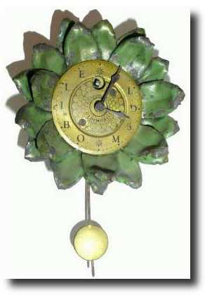 C.1935, Lux Clock Mfg Co., Waterbury, Conn., SUNFLOWER advertising clock — Antique Clocks Price Guide