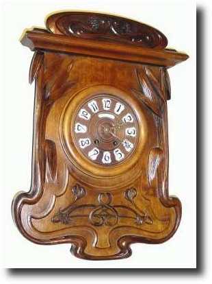 C.1910, French Art Nouveau Walnut Cartel clock — Antique Clocks Price Guide