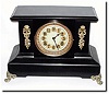 C.1900, New Haven "Fairfield' Black enamel over iron mantel clock in very good original condition.
