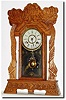 C.1905, New Haven Clock Co., "Norwich Linen" model pressed oak gingerbread in excellent original condition.
