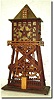 Mixed lot: an incomplete Seth Thomas move-ment (strike train missing), now in a craft project clock with a home-made wooden geared pump with governor assembly in a derrick style case.