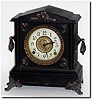 C.1907, E. Ingraham, Black Enameled Wood shelf clock, in complete but dirty condition.