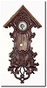 C.1930, German, Black Forest Mini Wall clock, in a carved case of oak leaves and branches Ö has more detailed carving than any of this group, but without the top trim, and the case with dry splits.