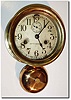 C.1936, Seth Thomas, "Monitor' Ship"s Bell striking wall clock, in a polished brass case and in good original condition.
