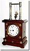 C.1910, German, Junghans, Swinging Doll clock in very good original condition.