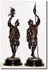 C.1904, Ansonia "Falconer and Fisherman', side garniture statues.